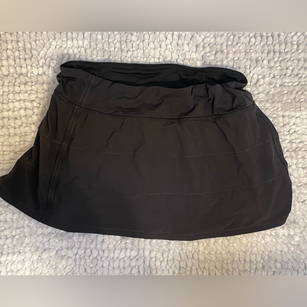 Lululemon Athletic Black Skirt with shorts under. Drawstring. Size 10